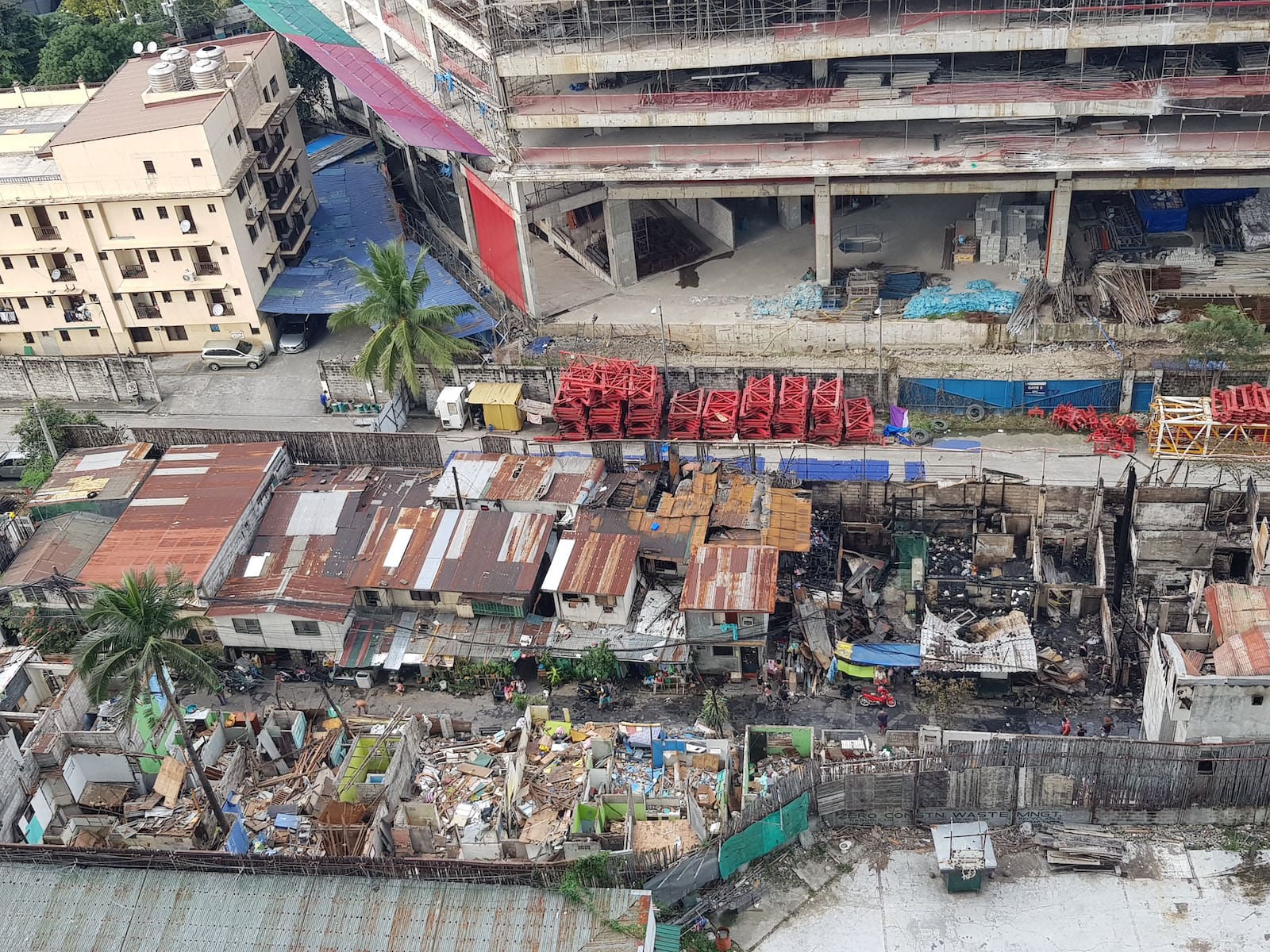 destroyed residential houses manila slum community shot by sai versailles
