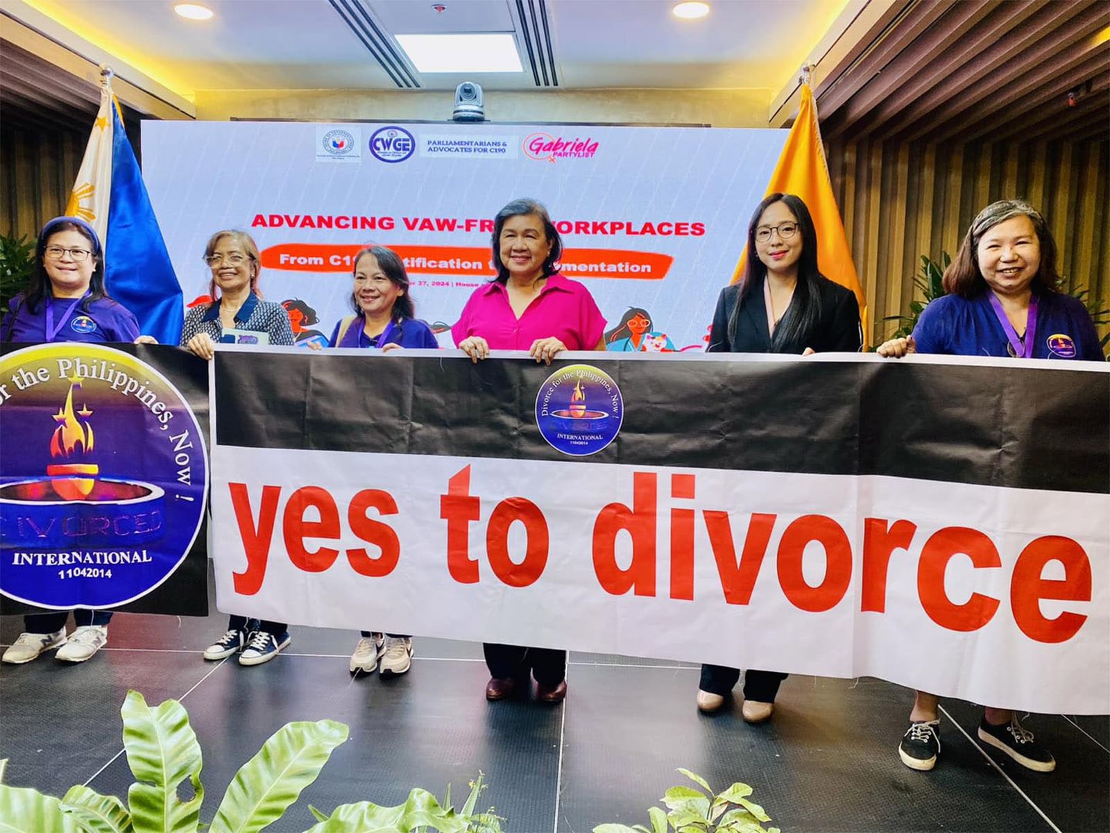 gabriela womens party holding pro-divorce banner