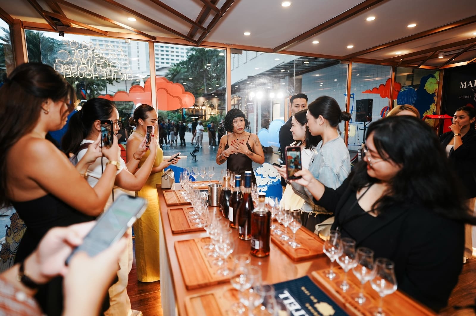 group of people tasting martell cognac