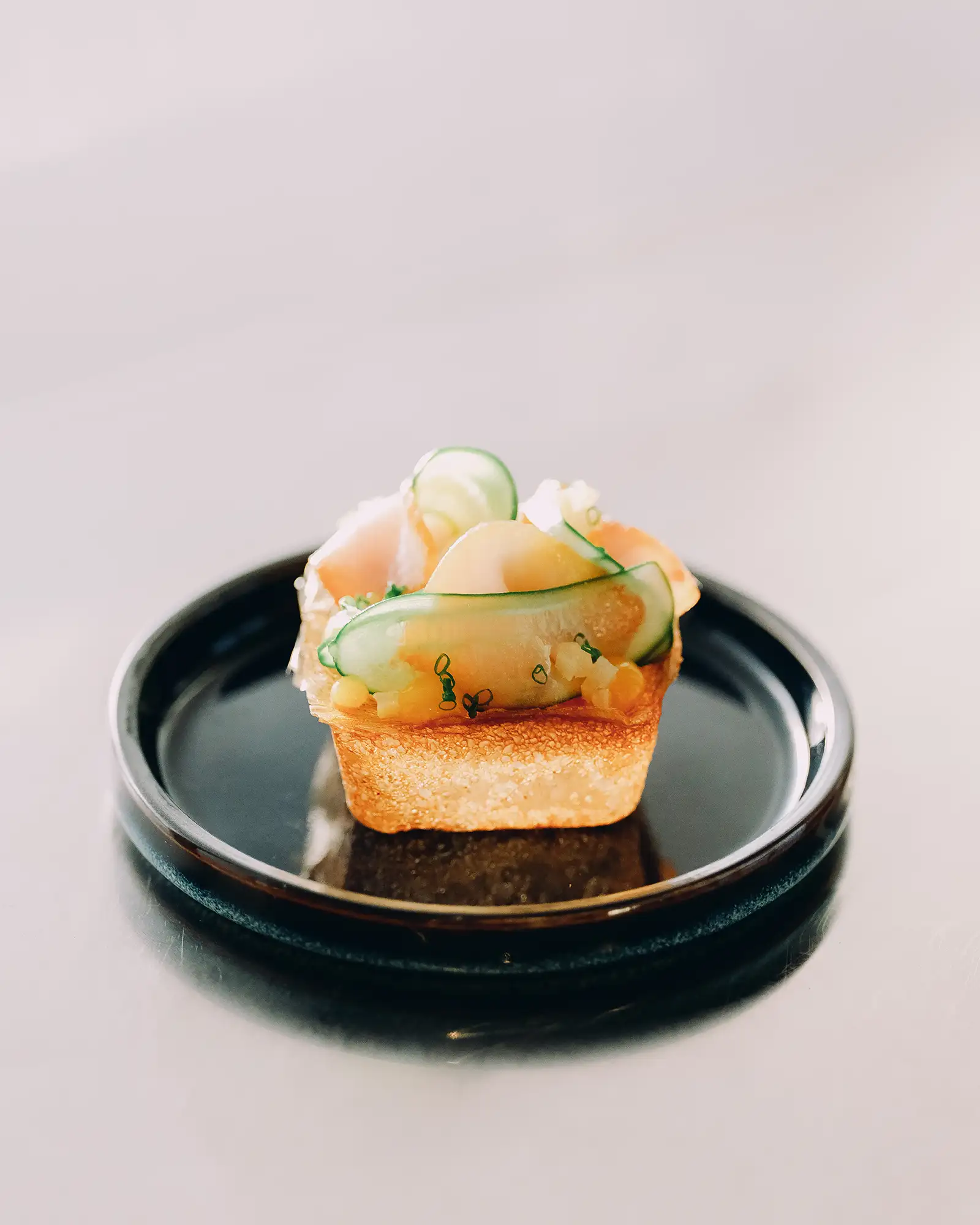 Shoyu swordfish, cucumber, ponkan gel, preserved lemons, dashi crystal bread