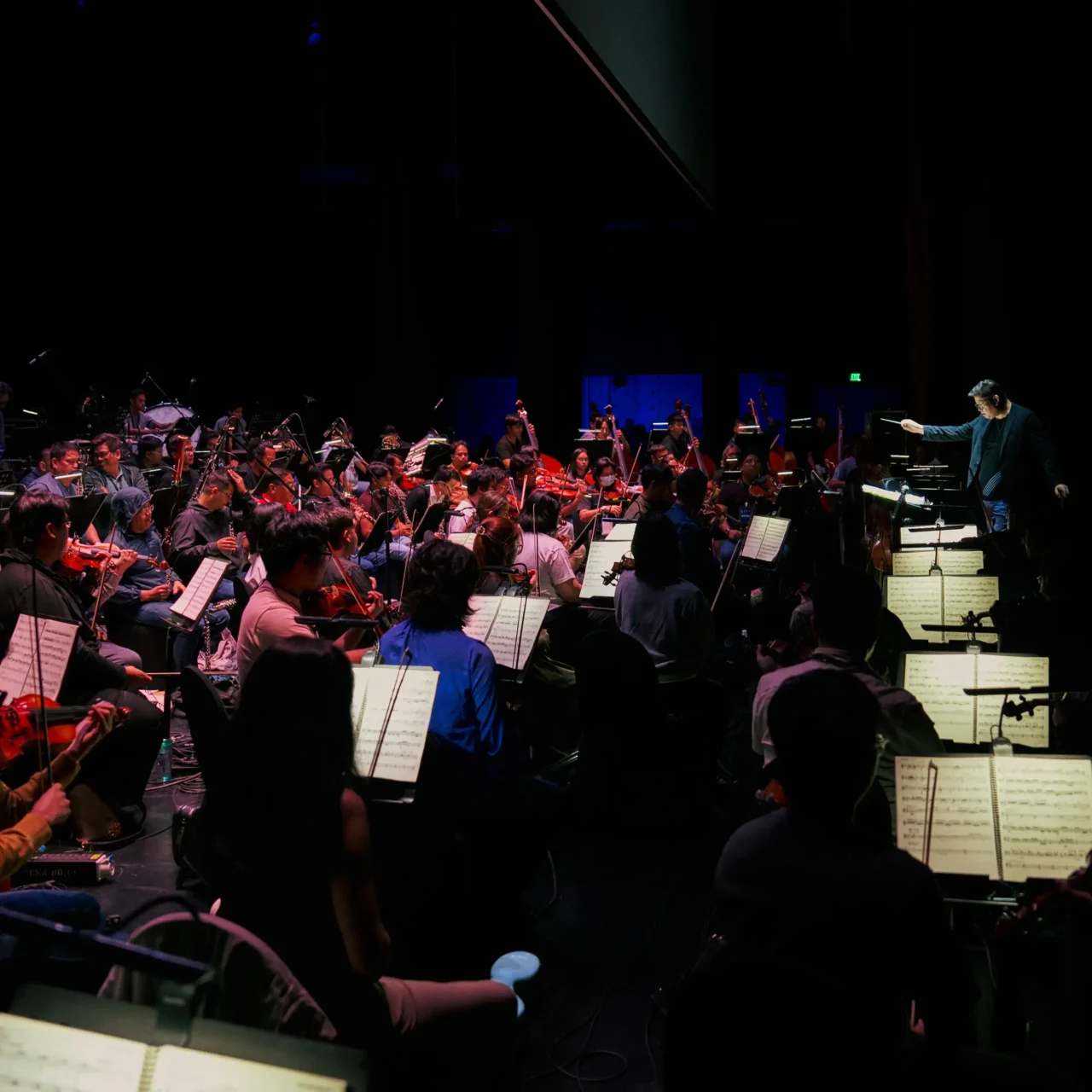 gerard salonga conducting the filharmonika orchestra for Film Concerts ph