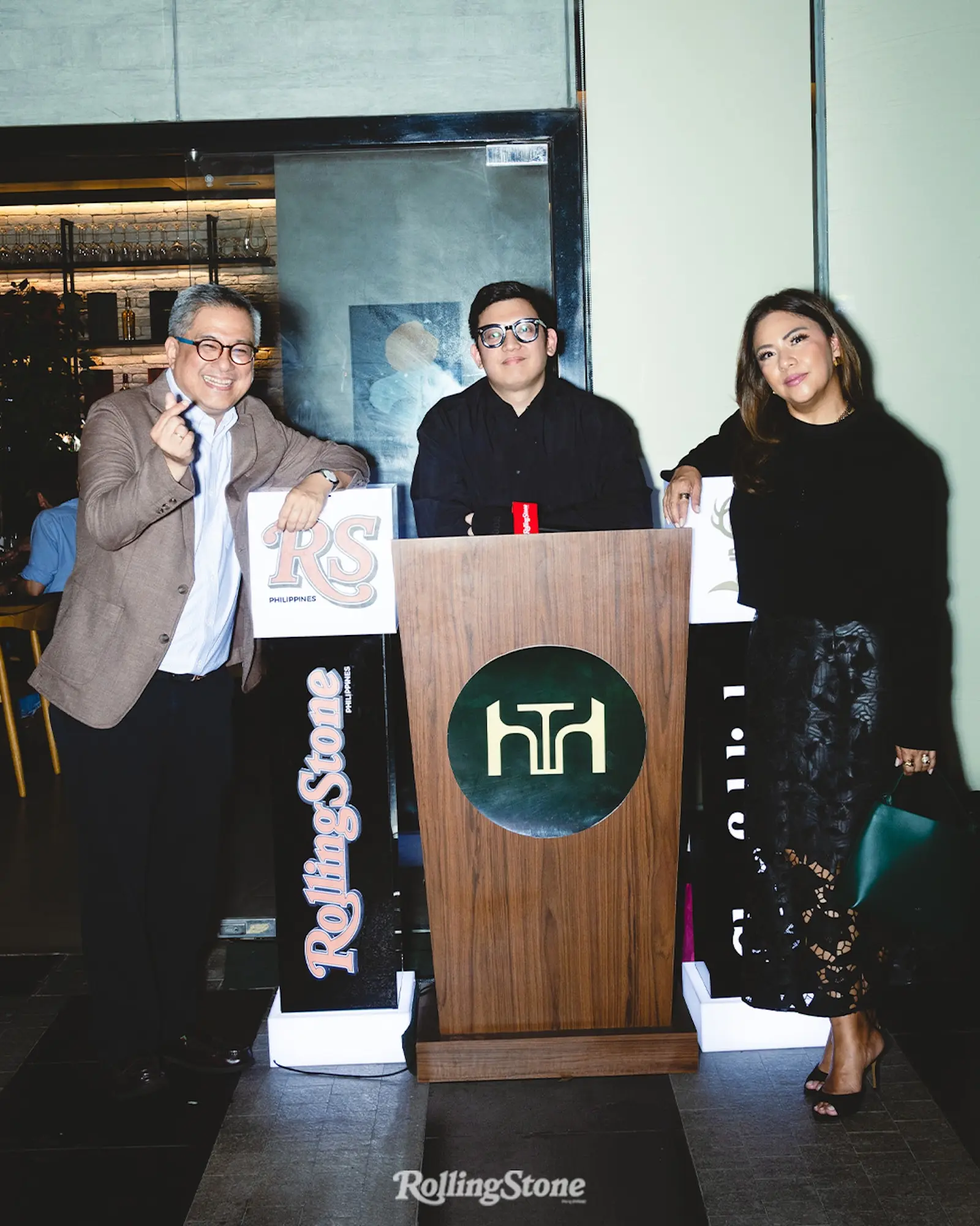 Constantino-Torres (right) posing with Rico Hizon (left) and Rolling Stone Philippines Editor in Chief Jonty Cruz (middle).