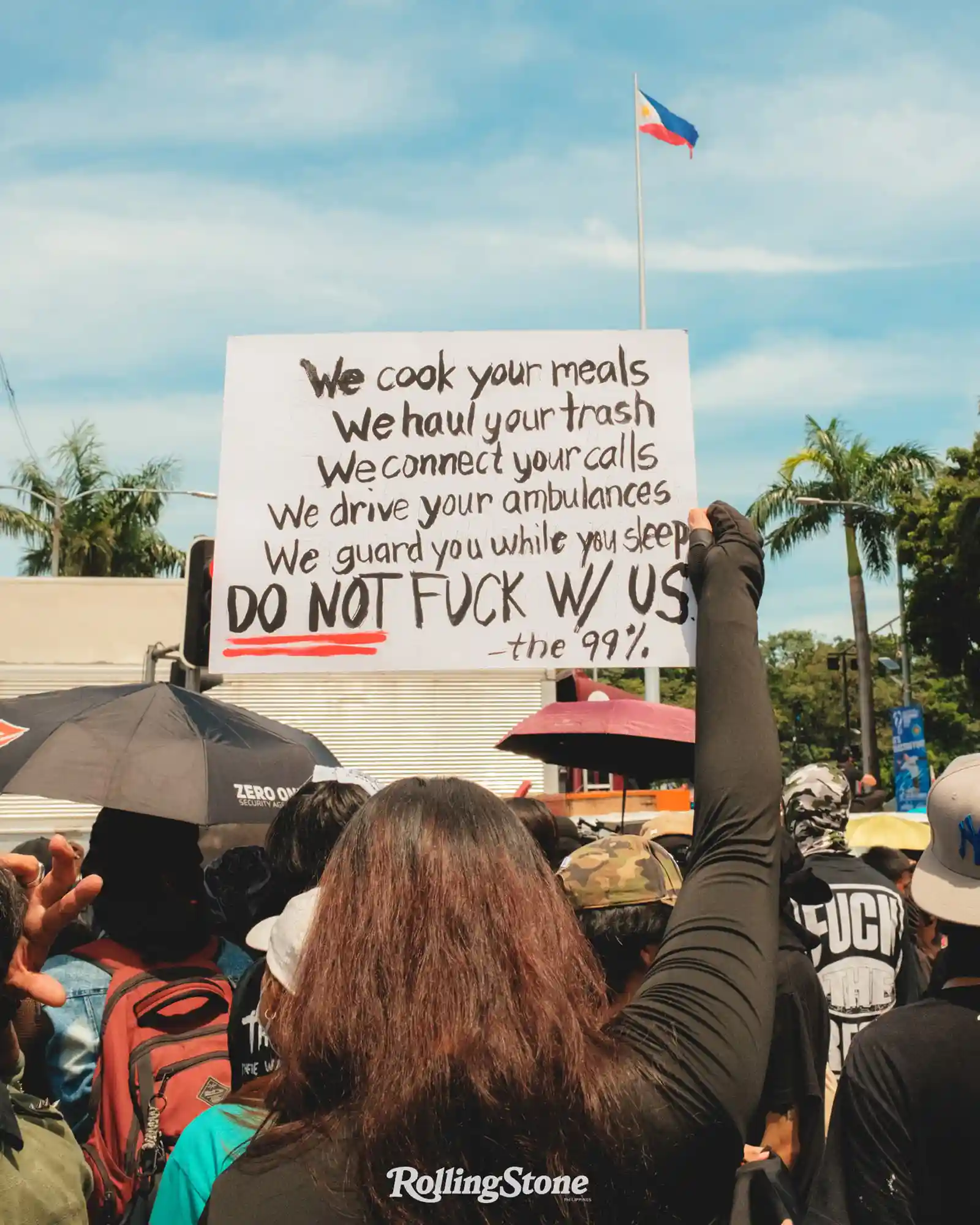 protester holding placard