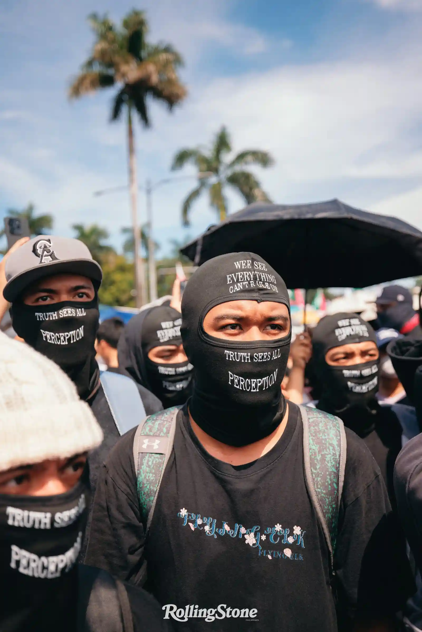 protesters wearing ski masks