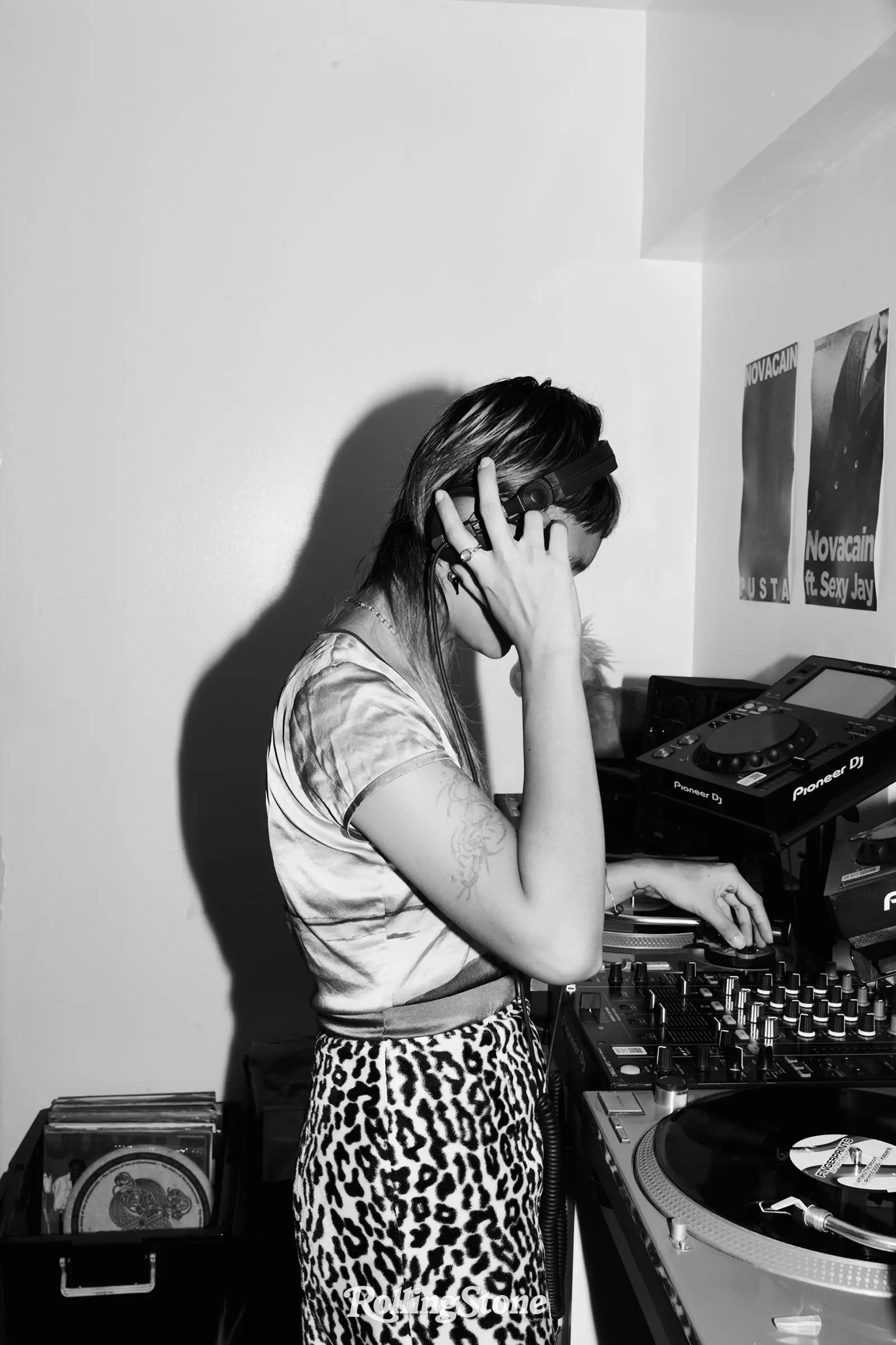 Aly Cabral playing vinyl records