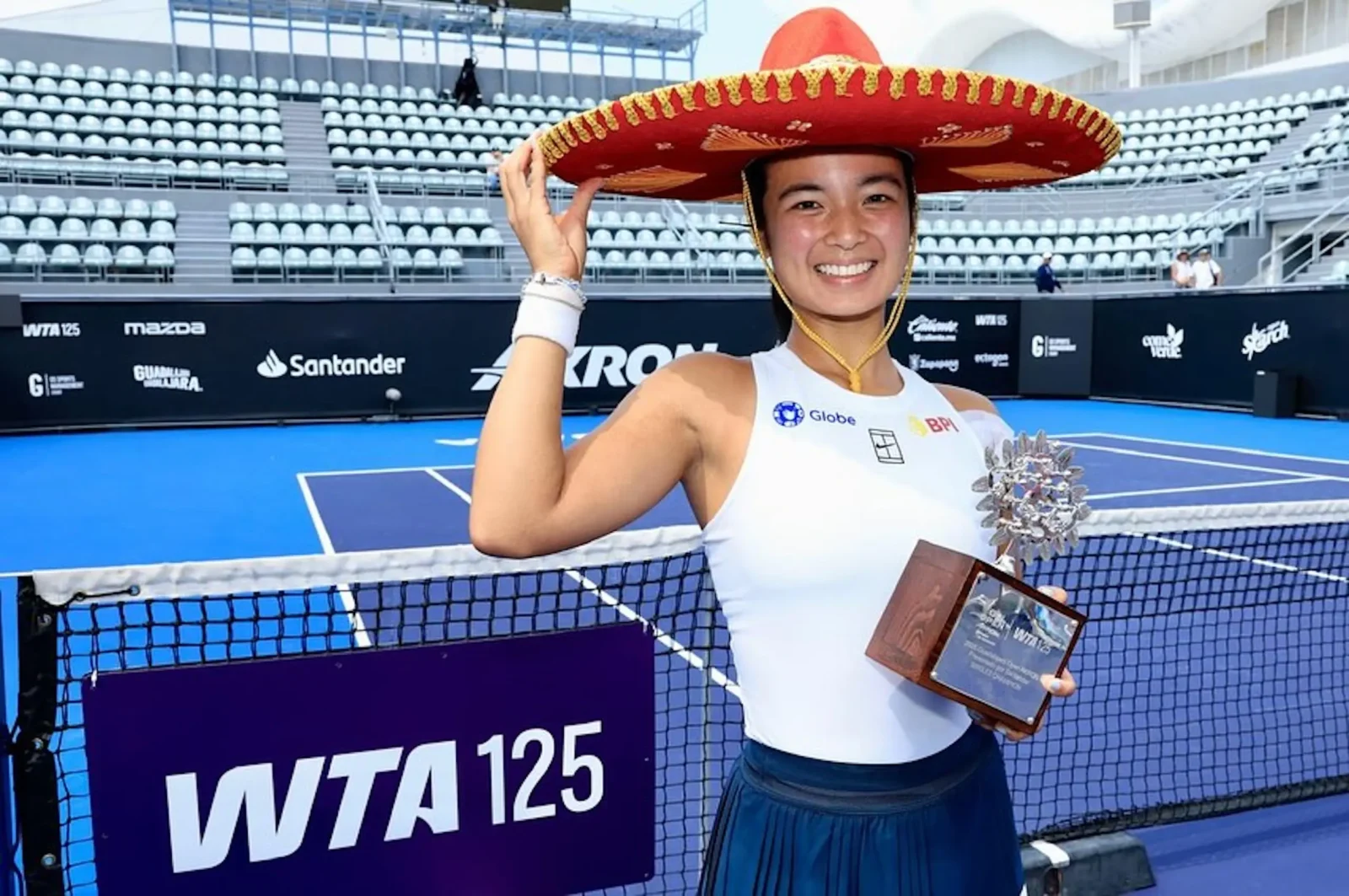 alex eala holding her Guadalajara 125 Open championship trophy in september 2025