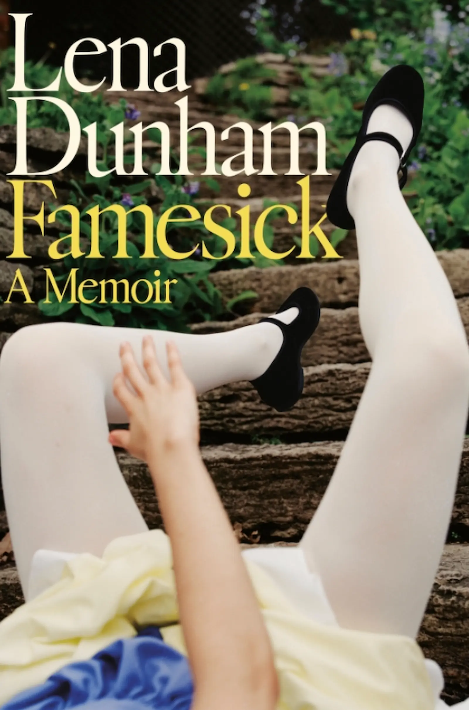 Book cover for Lena Dunham's memoir Fame-sick; a person in white tights and black Mary Jane shoes rests legs on stone steps.