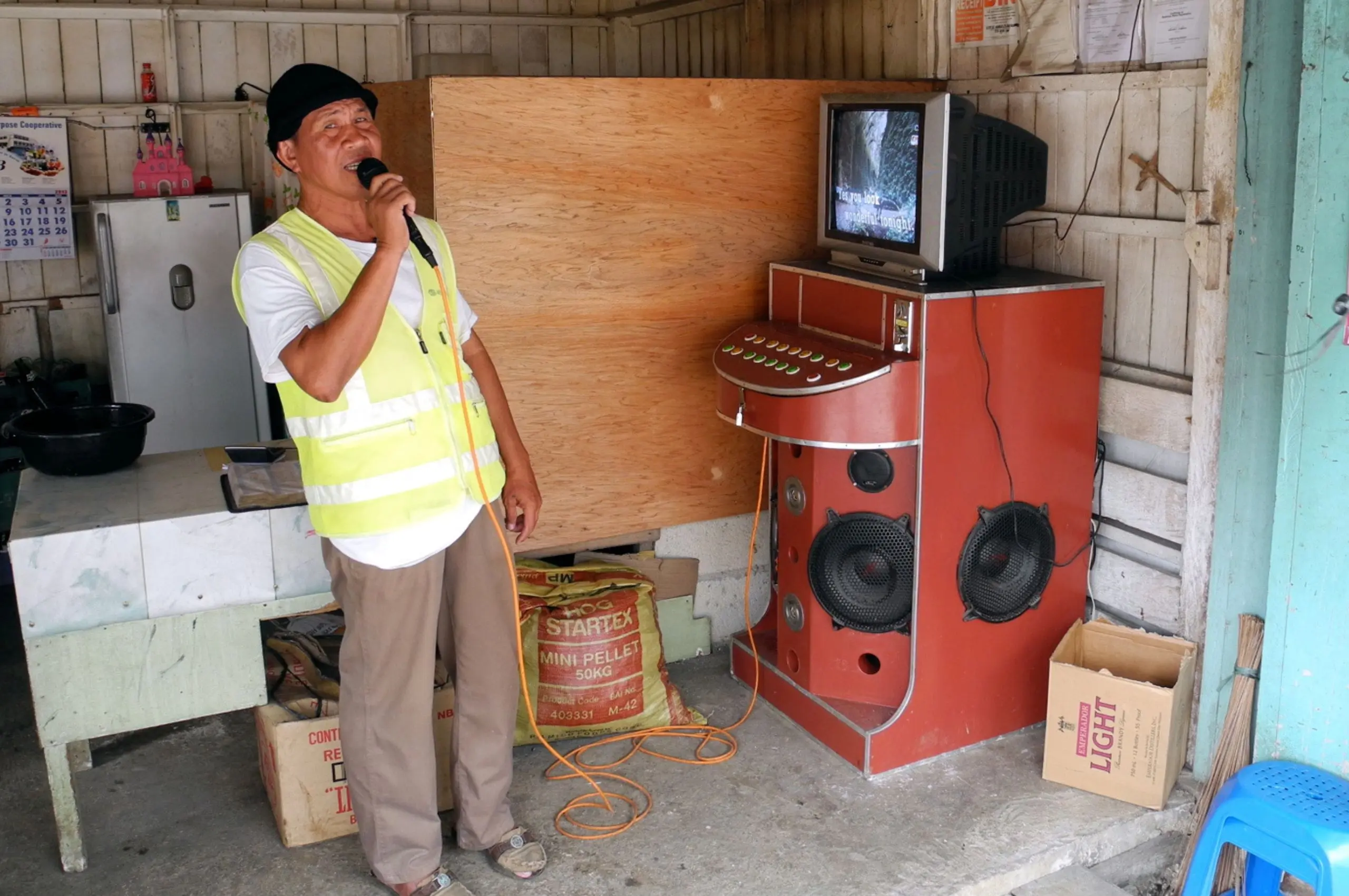 man and videoke machine