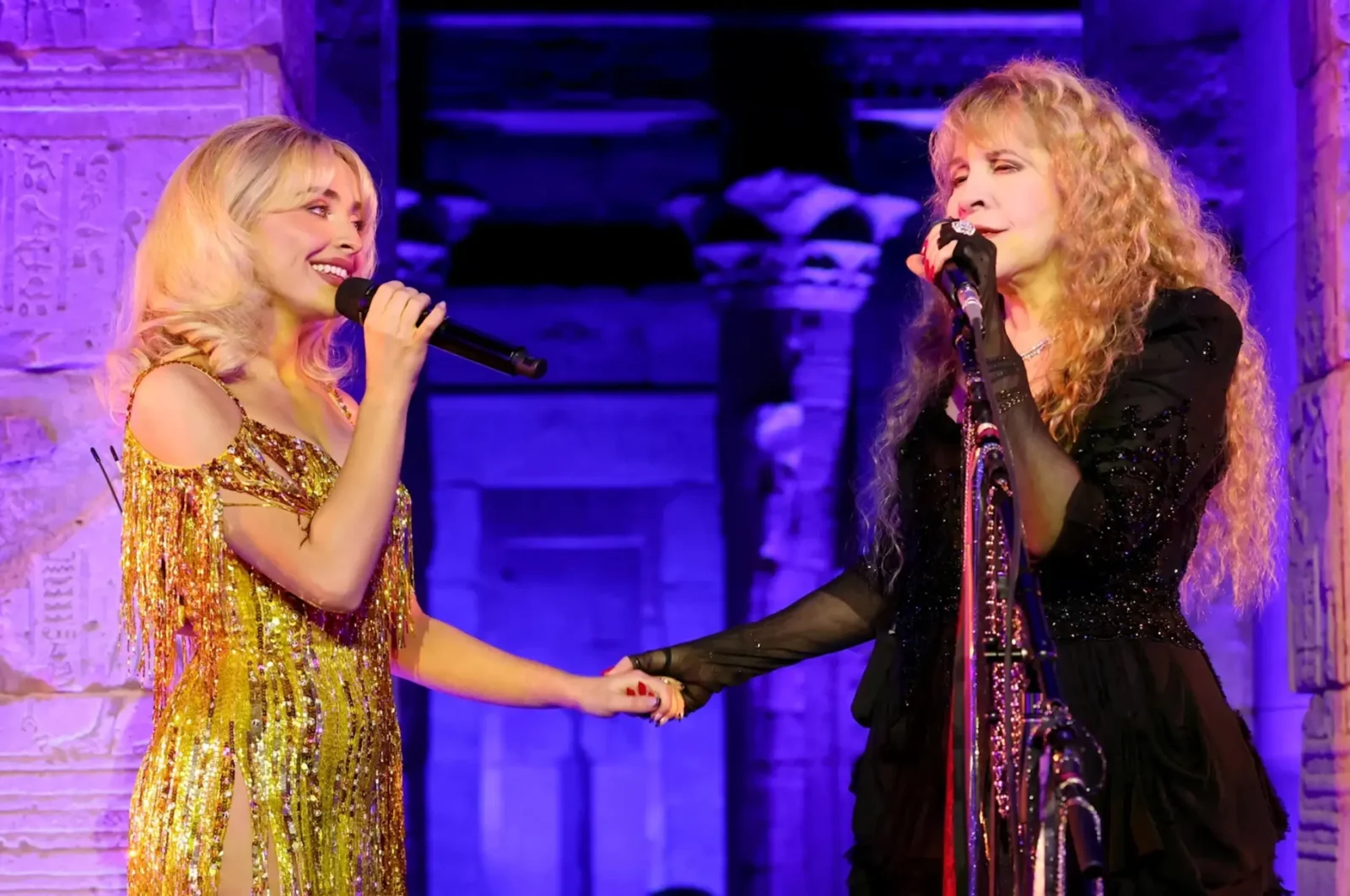 Sabrina Carpenter and Stevie Nicks perform onstage during the 2026 Met Gala .