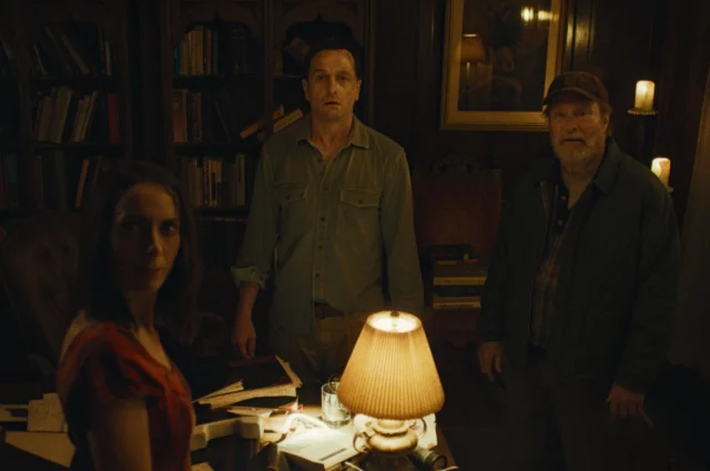 Kate O’Flynn, Matthew Rhys, and Stephen Root in Widow's Bay. Photo from Apple TV/Official Website