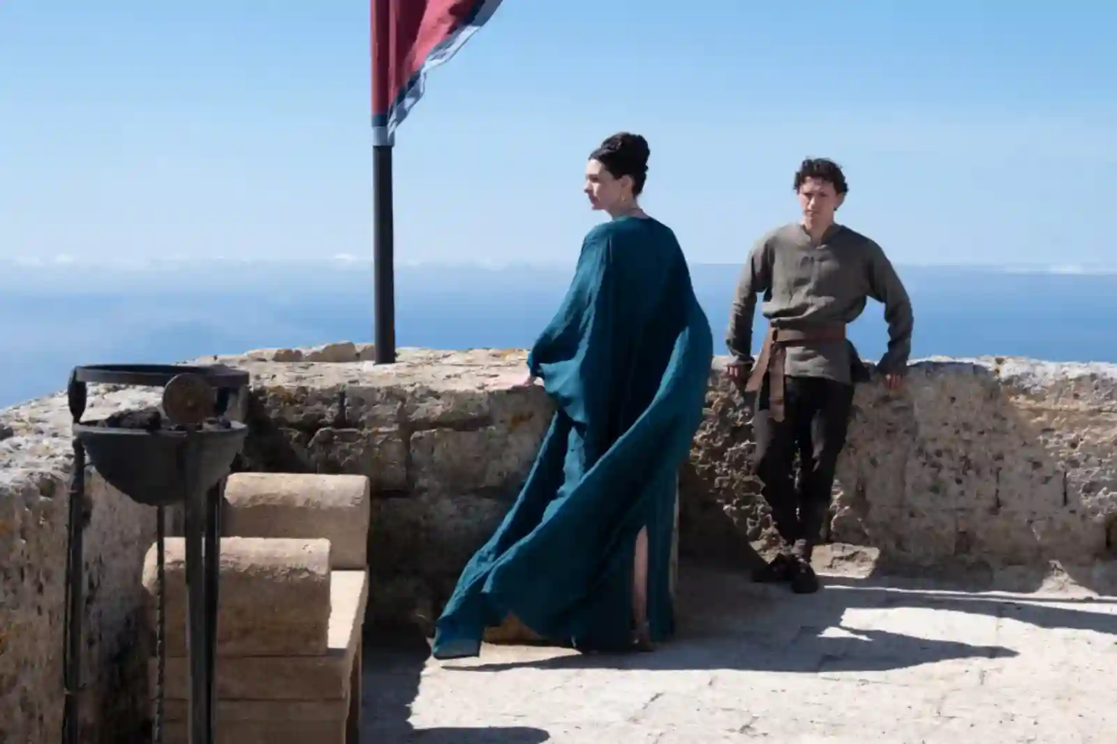 Hathaway and Holland as mother and son in The Odyssey