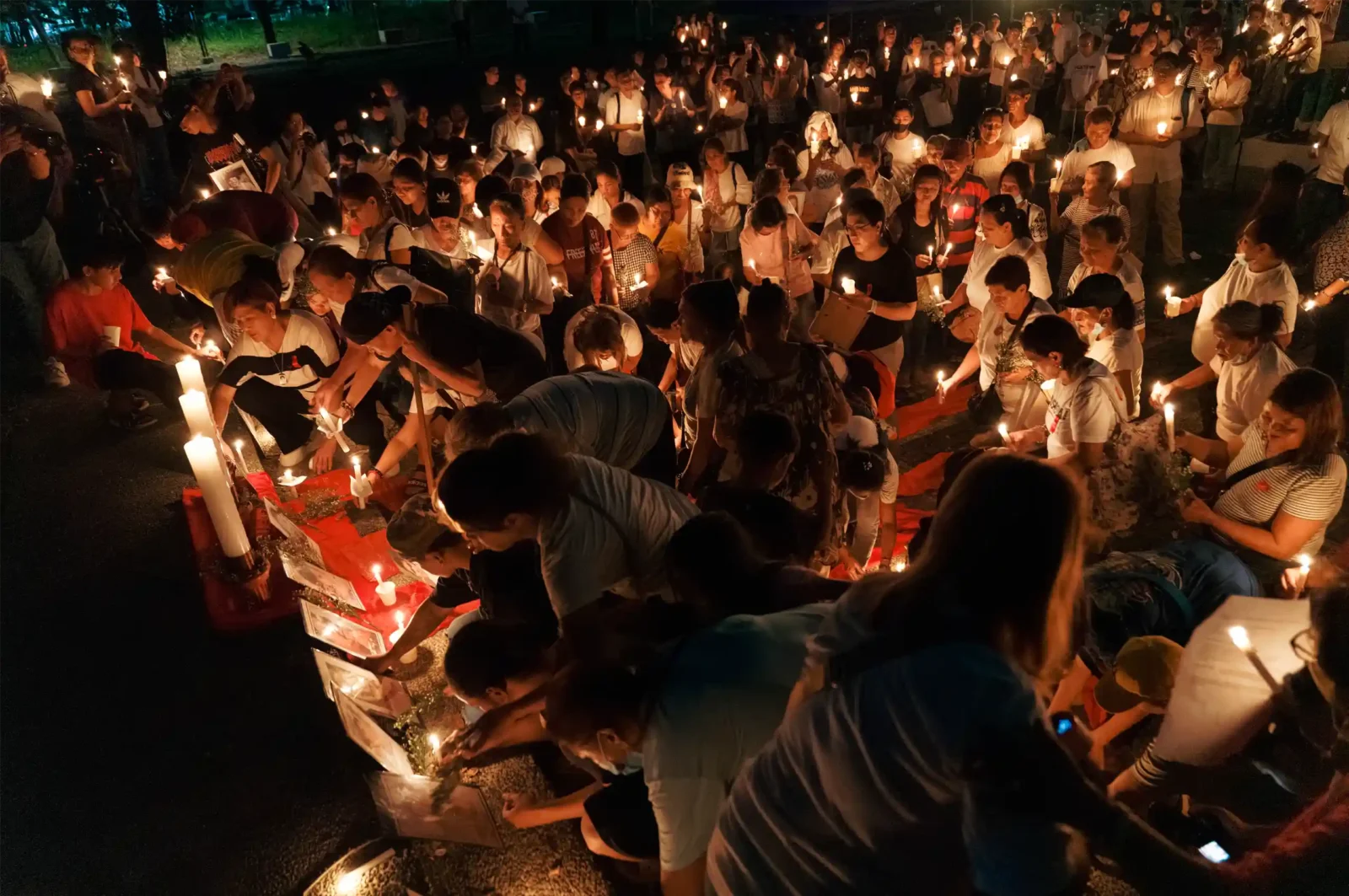 drug war family-victims and survivors during candle light ceremony